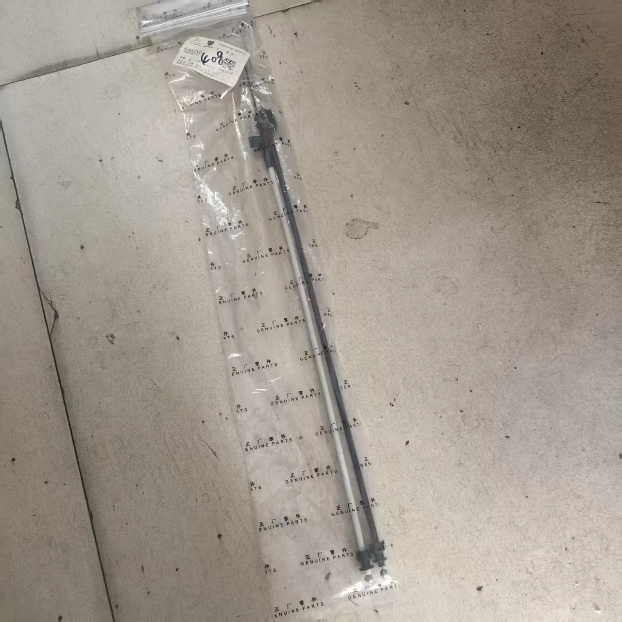 Detalle del cable de tracción del panel de climatización