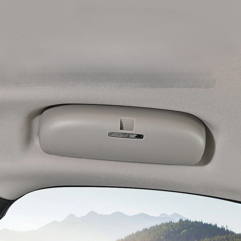 Soporte interior para guardar gafas de sol en el coche
