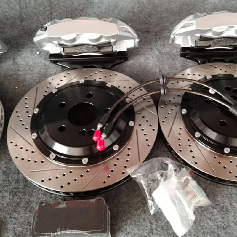 Kit frenos Syeten discos ranurados y pinzas para Volvo S60 - imagen 5
