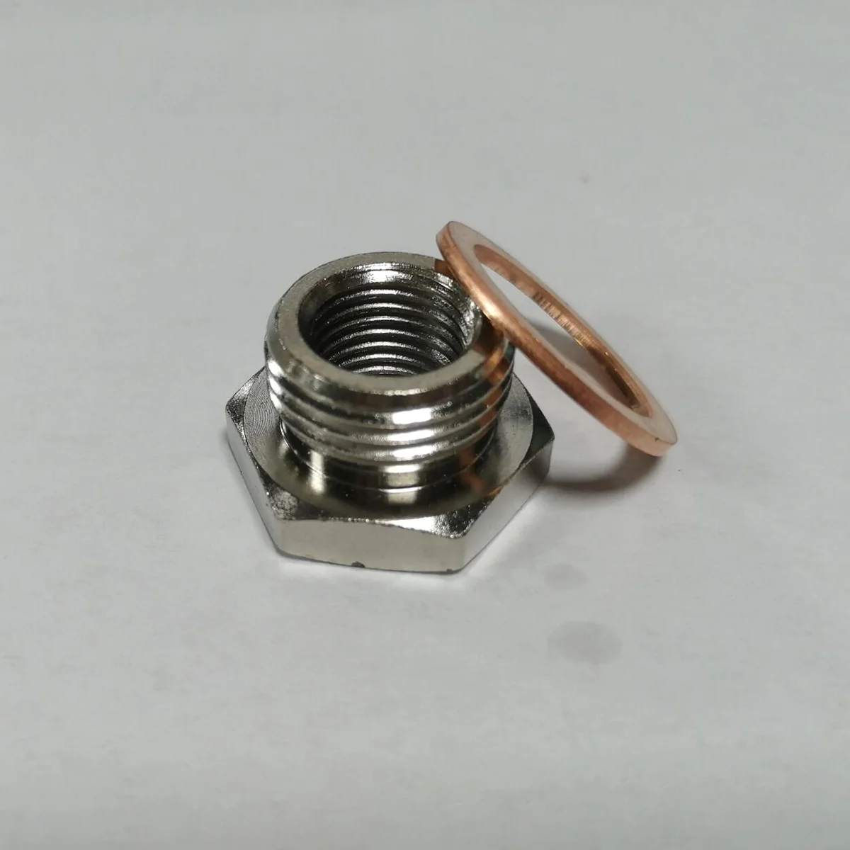 Adaptador reductor de acero para sensor de oxígeno en escape