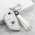 white B keychain