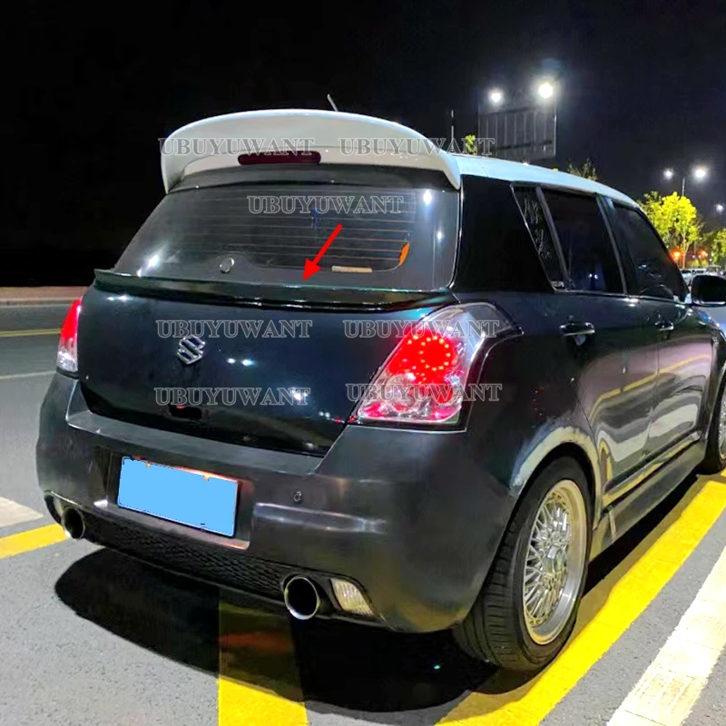 Montaje del ala trasera en el portón del Suzuki Swift