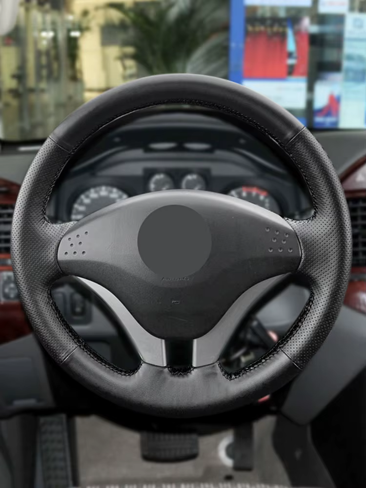 Cubierta de volante en cuero perforado – Mitsubishi Pajero V73