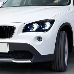 Kit de faros delanteros LED con proyector para BMW X1 E84