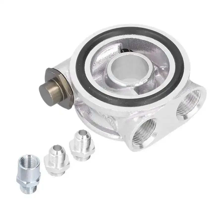Adaptador de placa sándwich visto desde arriba con puertos de rosca