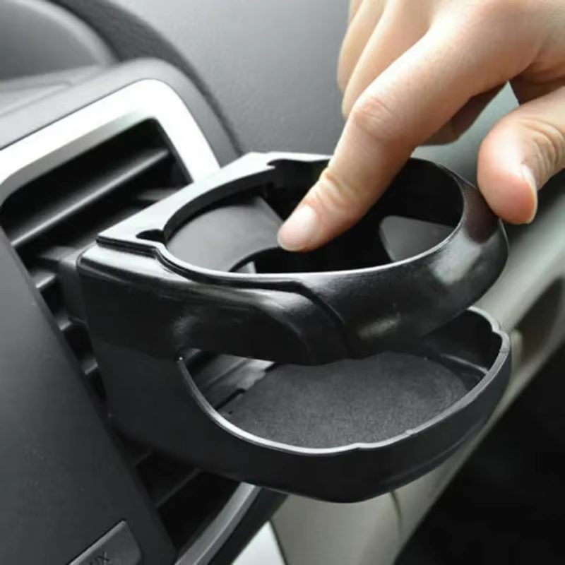 Portabebidas para coche con fijación en rejilla de ventilación