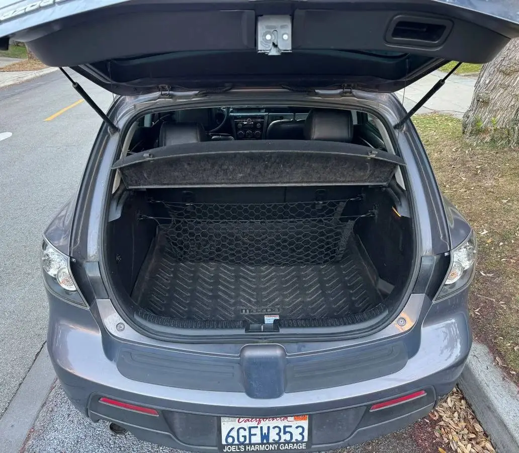 Puntales automáticos para puerta trasera con resorte Mazda3 MK1