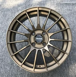 Llantas de aleación ENK RS055RR 15 pulgadas 4x100 bronce y blanco