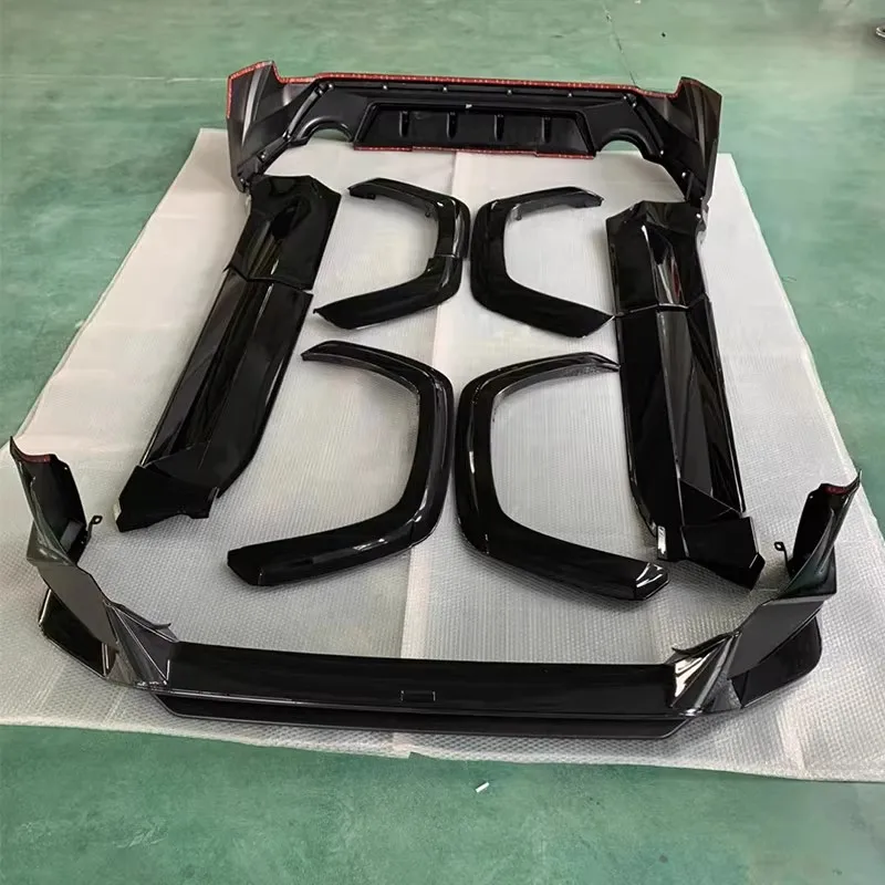 Kit carrocería Toyota RAV4 2020-2025 sin pintar – faldas y spoiler delantero