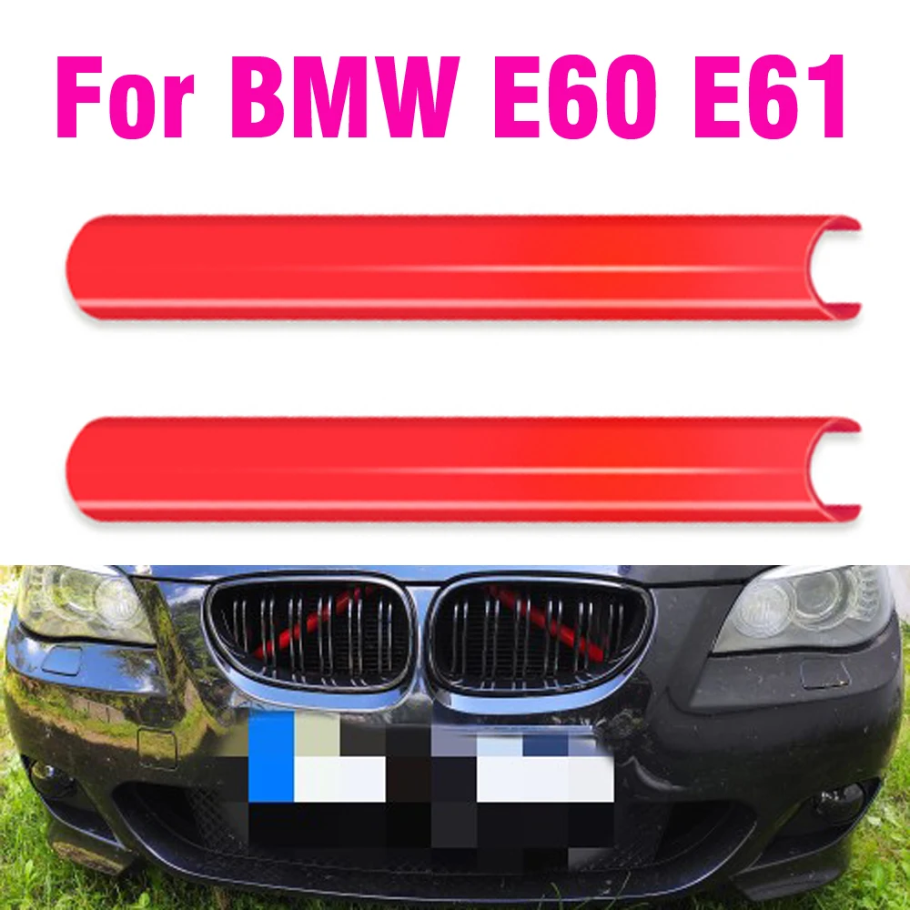 Tira adhesiva amarilla instalada en la rejilla delantera de un BMW E60